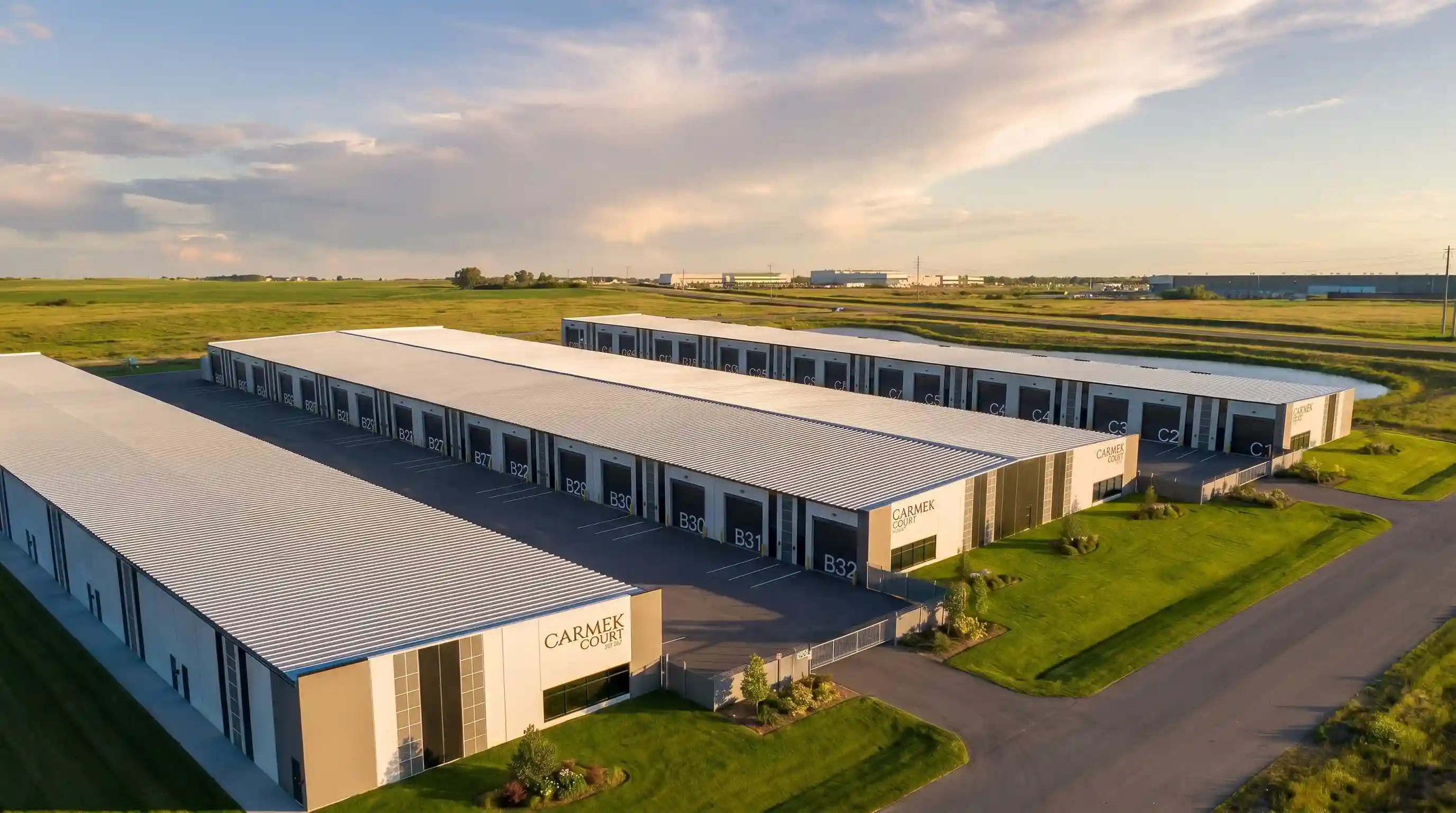 Aerial rendering of the Carmek Court Flex buildings, with numbered bays facing shared drive aisles
